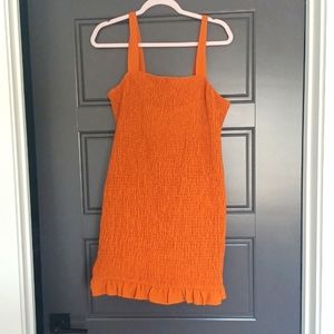 Orange smocked dress